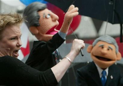 puppets of Bush and Kerry debate in Times Square
