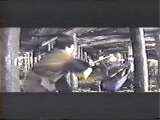 It's hard to see, but Jackie's the one on the ground, splitting his legs in the air to avoid the spear