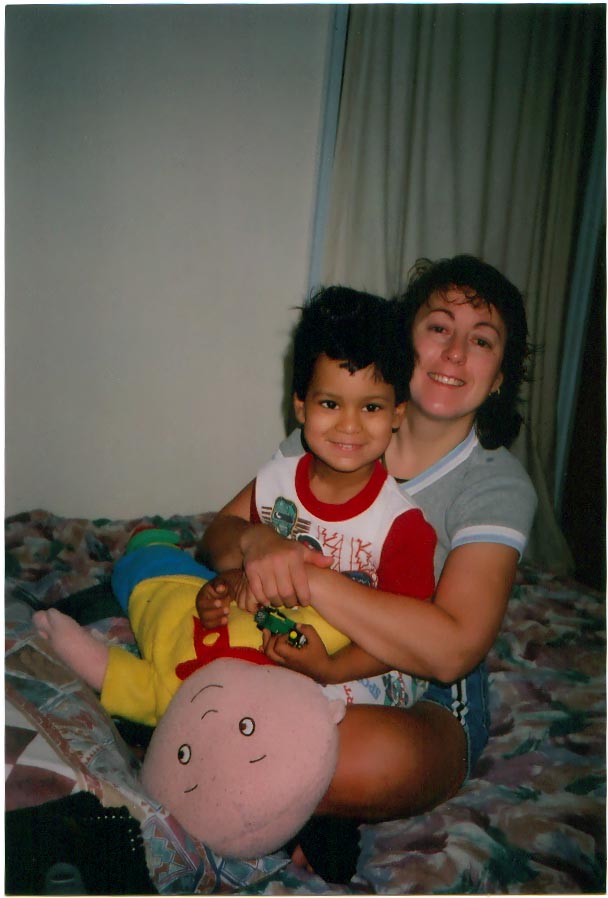 CUDDLING WITH MOMMY, JULY 2000