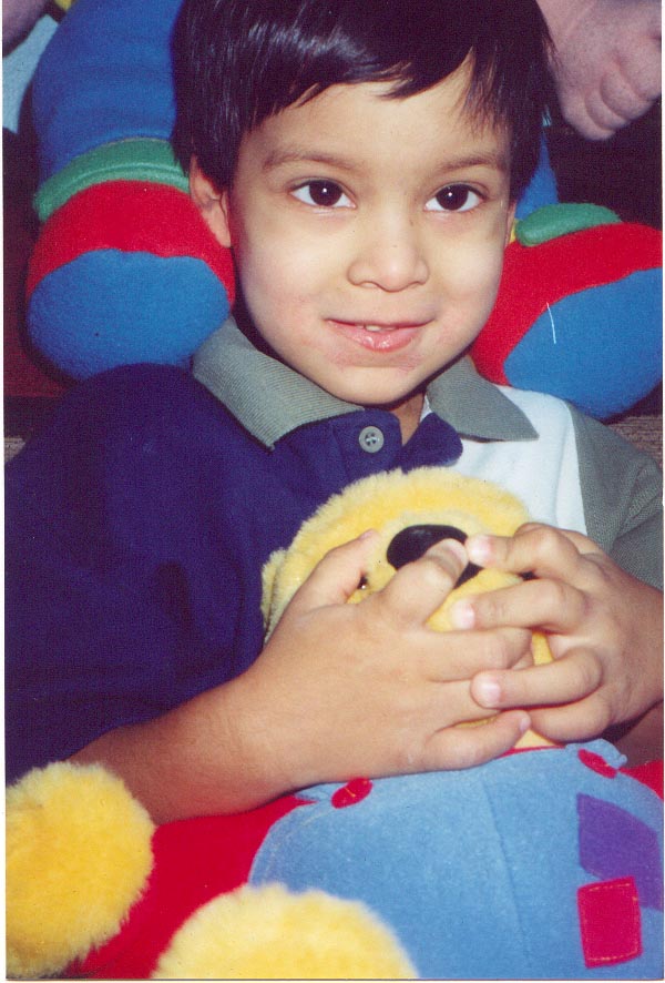 CUDDLING POOH BEAR, MAY 2000