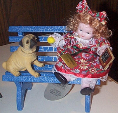 Doll on bench