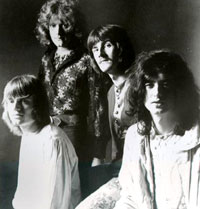 Led Zeppelin (from left to right): John Paul Jones (Bass and Keyboards), Robert Plant (Lead Vocals and Harmonica), John Bonham (Drums), Jimmy Page (Guitar)