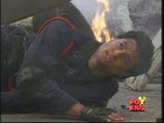 Eric falls to the ground