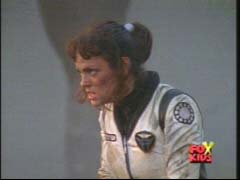 Jen has Ransik chase into a nearby building