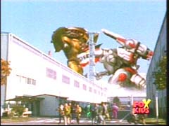 Doomtron battles the Quantasaurus Rex