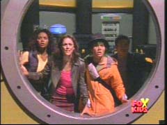 Rangers look out the window of Timeship in tears