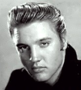 Elvis in a black and white publicity photo.