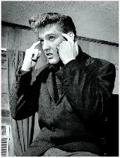 A young Elvis looking like he needs a break.