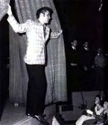 Elvis performing in the 50s.