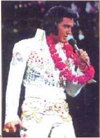 Elvis with mike caught in necklace