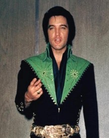 1970s Elvis Wearing Green and Black Jumpsuit