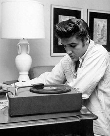 Elvis Listening To A Record