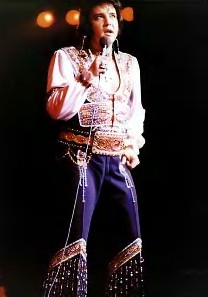 A candid Elvis onstage during the 70s.