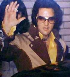 Elvis waving