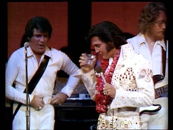 Elvis and Charlie Hodge during Aloha show