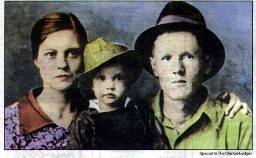 Elvis and his parents 1938