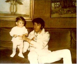 Elvis and toddler Lisa Marie