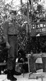 Elvis helping move a war monument in Germany.