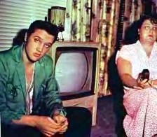 Elvis at home with his mother circa 1956