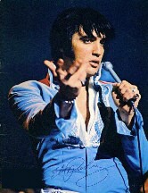 Elvis wearing a blue jumpsuit