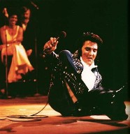 Elvis clowning aroung onstage