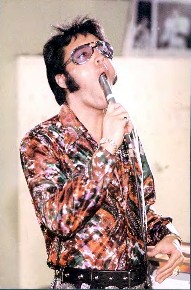 Elvis goofing off while rehearsing for That's The Way It Is