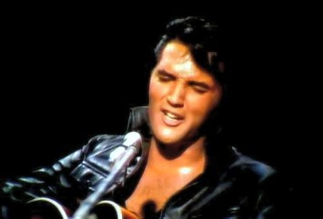 Elvis decked out in black leather.