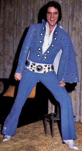 Elvis Wearing a Blue Spangled Jumpsuit