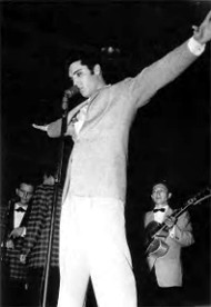 Elvis on stage in 1957.