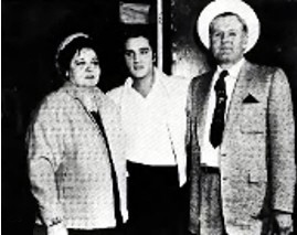 Elvis with his parents in the 1950s.
