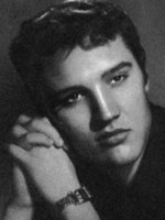 Elvis leaning on his hands.
