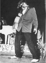 Young Elvis onstage in the 1950s.