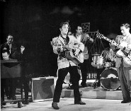 A young Elvis performing on TV