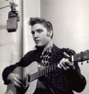 A young elvis recording a song.