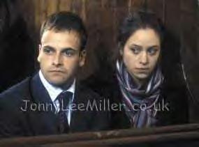 Johnny Lee Miller and Jodhi May in "The Escapist"
