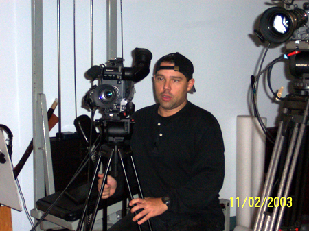 Manny adjusting the tripod.