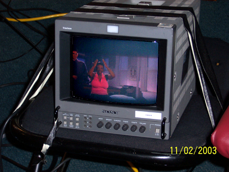 CU of monitor showing Chris and Phillesa.