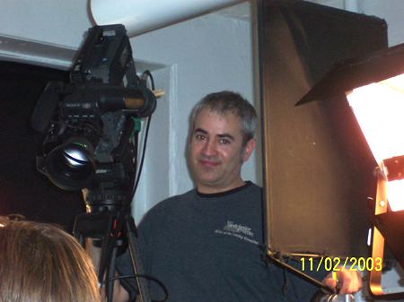 Matthew smirks to camera.