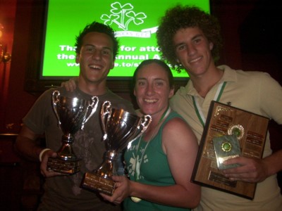 Best and fairest winners Cameron Carney, Trish Brown, and Laurie Bere, celebrate at the Pig 'n' Whistle last night.