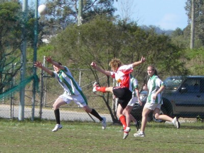 Bronwyn Bassett attempts to block in the final against Harps