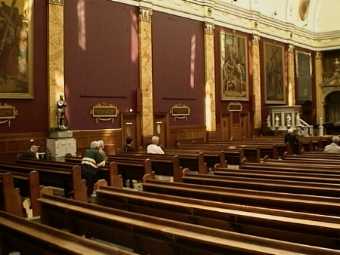 left hand wall of church with four stations removed for restoration