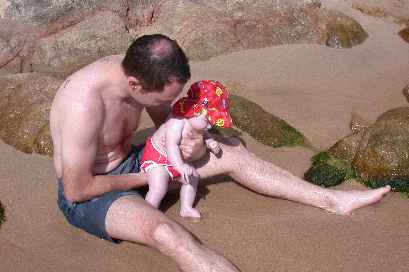 ... ooohhh, it's colder than I thought, and that sand is so tickely on the soles of my feet...