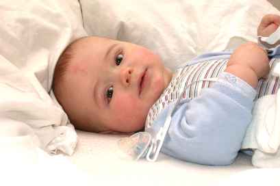 Sunday morning in Mom and Dad's bed... what a way to start the day!