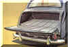 The exceptionally large luggage compartment is fitted with an interior light and switch - The lid can be used as a platform to carry additional luggage - the spare wheel is enclosed below with access by a vertical sliding panel carrying the number plate - both compartments can be separately locked