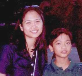 me and my brother Jed  celebrating his 11th b-day at Manila Zoo last April 2002