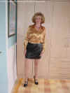 Anne in shinyblouse and leather mini skirt1