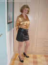 Anne in shinyblouse and leather mini skirt3