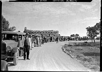 AN AUTO CARAVAN CONDUCTED BY NATURALIST EDWIN MCKEE AT YAVAPAI OBSERVATION STATION.<br> CARS WRAP AROUND THE DRIVEWAY. SEP 1932. NPS PHOTO.