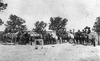 BRIGHT ANGEL TRAIL HORSE/MULE PARTY ABOUT TO START DOWN TRAIL. GROUP POSING AT TRAILHEAD ON RIM. LOADING PLATFORM. CIRCA 1902. DETROIT PHOTOGRAPHIC. 