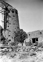 CONSTRUCTION OF DESERT VIEW WATCHTOWER; TOWER & KIVA WITH SCAFFOLDING. SEE 00662 FOR LANDSCAPE. 15 AUG 1932 NPS PHOTO.